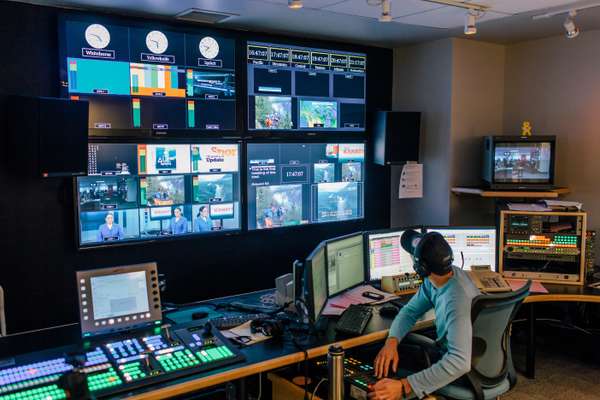 Technical director Allan Gofenko at the controls with a gridwall of screens