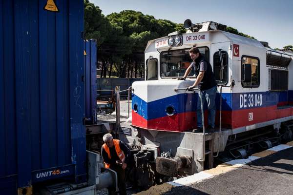 A locomotive being coupled to freight containers in Manisa