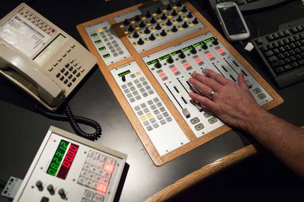 Fingers at the ready in the radio control room