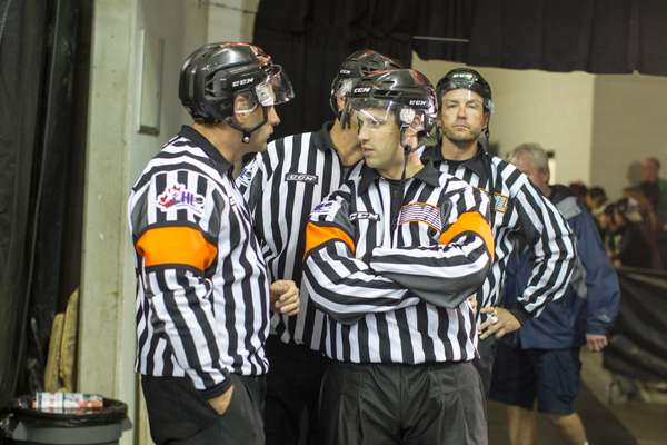 Referees getting ready to earn their stripes