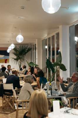 Guests enjoying dinner in the restaurant