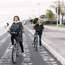 French tourists enjoyng the cycle lane near the Maat museum