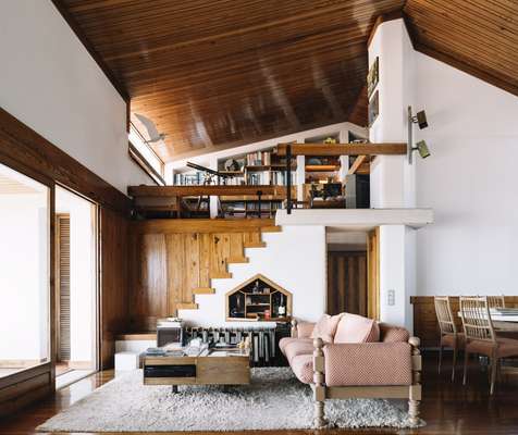 Living room leading to upstairs study 