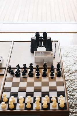 Chessboard coffee table with built-in stereo system 