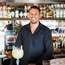 Jesse Williams mixing drinks  at his bar Paradiso