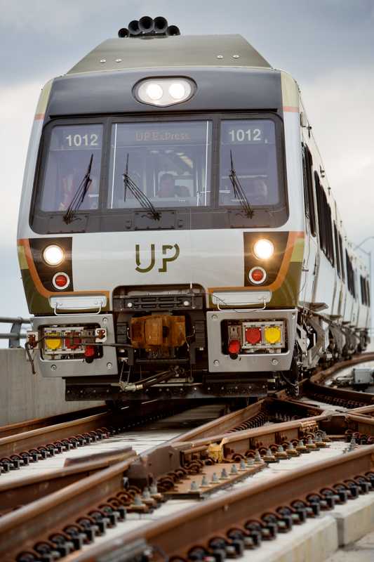 UP Express livery on Nippon Sharyo DMU