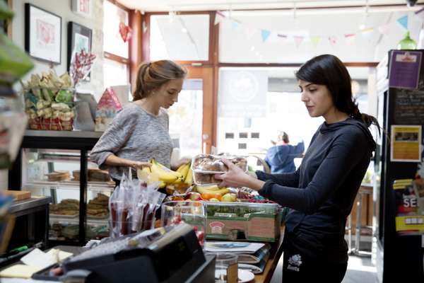 Cashiers play the role of friendly neighbourhood face