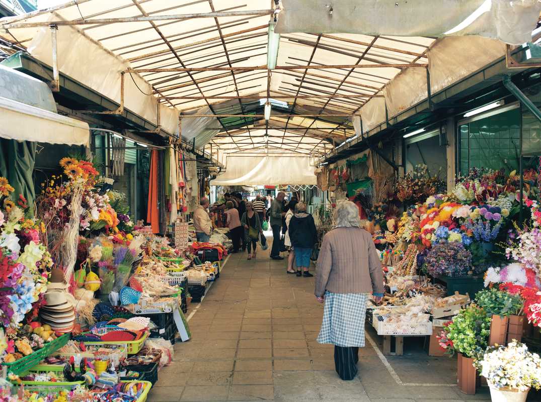 Flowers, fruits, vegetables and even Portuguese linen are available from stalls