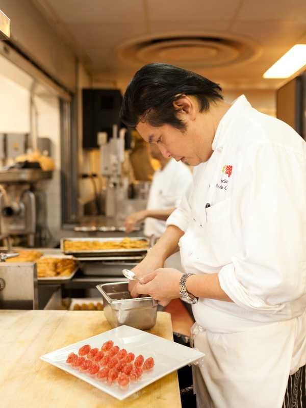 Sous chef preparing nigiri sushi 