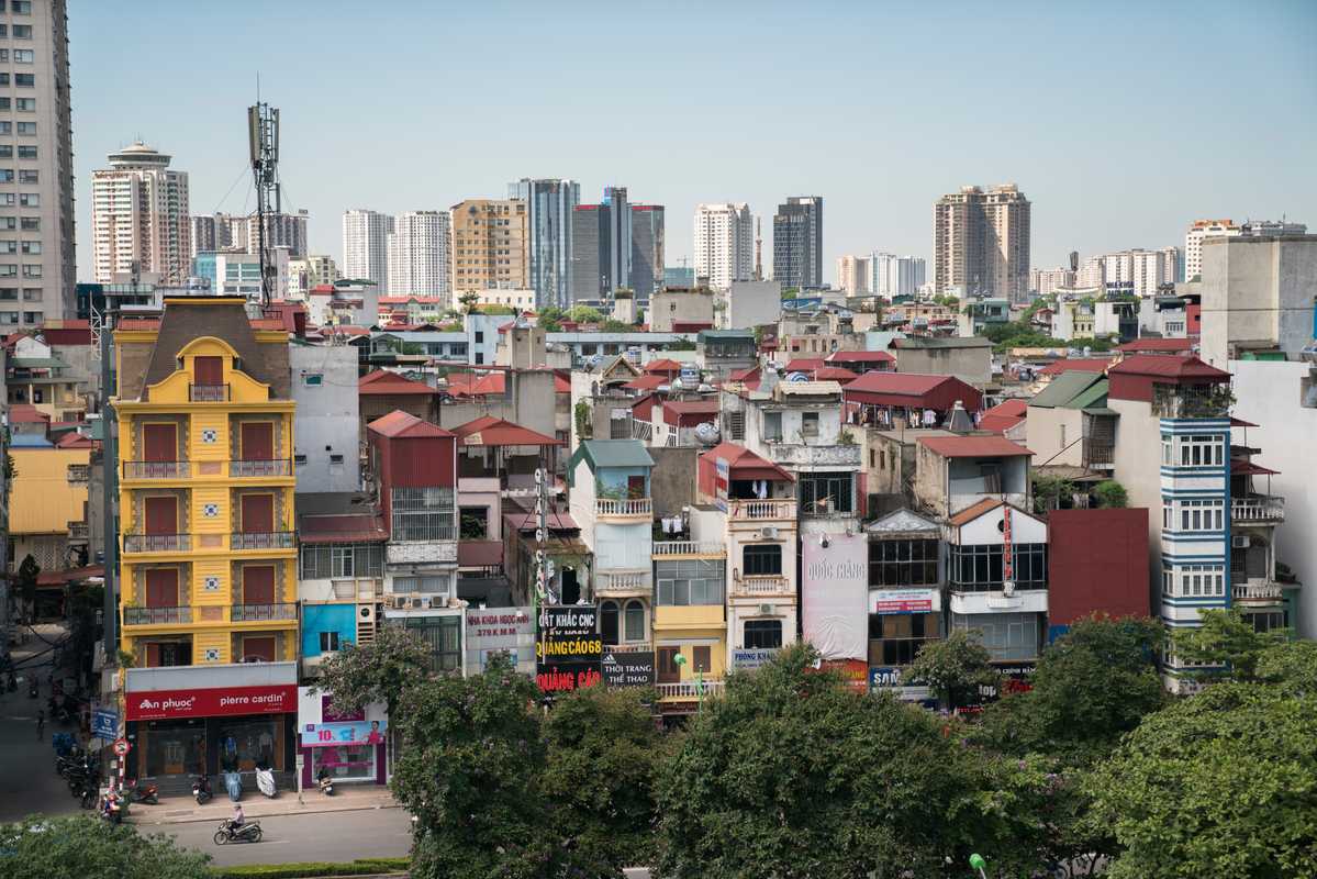 Residential buildings on Kim Ma Street in the shadow of the newly developed My Dinh area