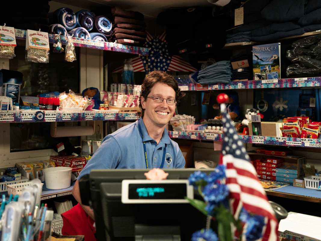 A deck steward in the ship’s gift shop