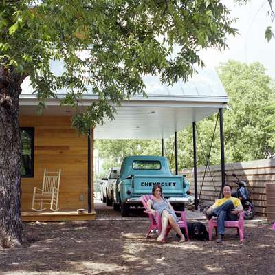 Bonnie Evridge and John Hart Asher in their backyard