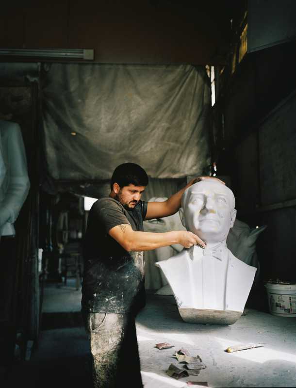 Studio worker preparing a bust of Ataturk