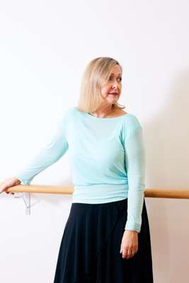 Kathleen Curwen-Walker takes a break at the barre 