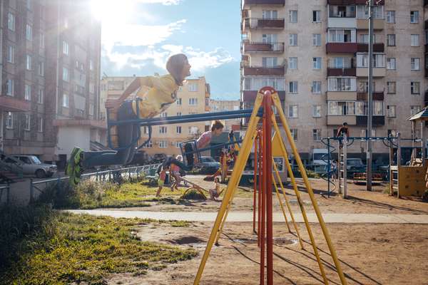 Children playing in a courtyard in Mirny