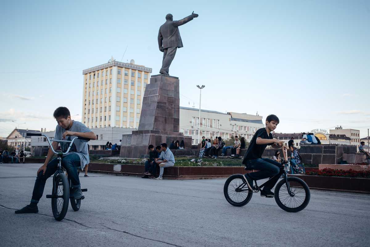 Teenagers riding their bikes in Lenin Square in the centre of Yakutsk