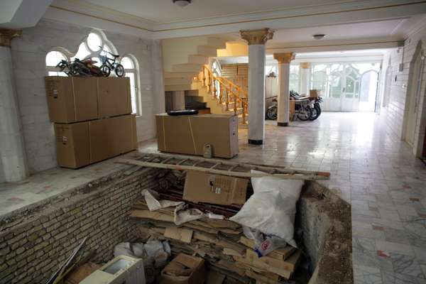 The unfinished swimming pool on the ground floor of Faqiry's house