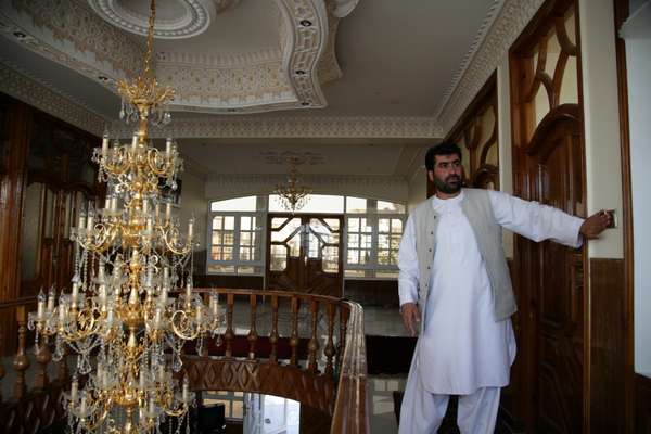 Habibullah Nasiri at his uncle’s house with its two-metre-high Italian chandelier