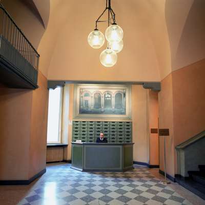 Boccia lamps are a common sigh in Milanese palazzos; seen here in the lobby of a building on Via Verdi