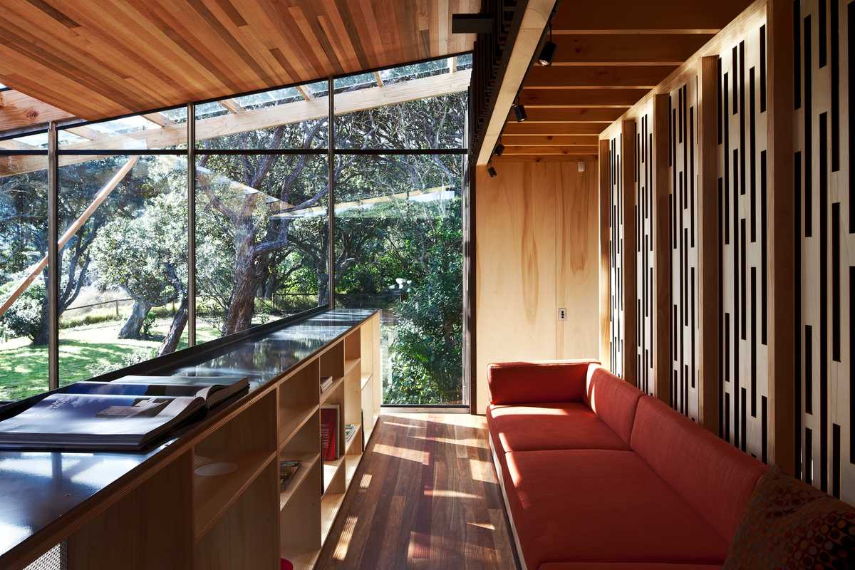 Mezzanine daybed with light, tree-filled views looking north