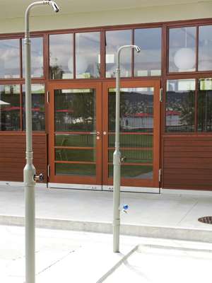 The original woodwork of the building was restored and outdoor showers were added