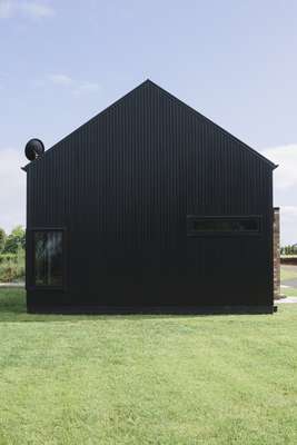 Corrugated steel was used to reflect the barn's rural roots