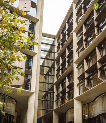 Sandstone and hand-patinated bronze on the façade