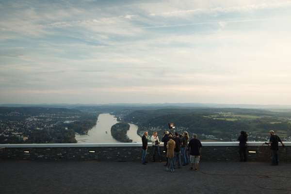 A film crew gathers at Bonn's Drachenfels castle ruins