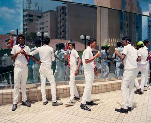 Boys eat free ice cream near the World Trade Centre