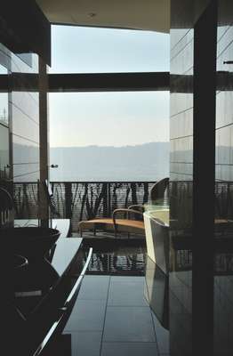 A view of Zürich and the hills beyond, from the bathtub of the junior suite