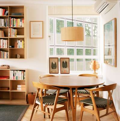 The chairman’s meeting and reception room on the top floor has a teak table and oak chair set by Norwegian Torbjørn Afdal for Bruksbo. Designed in 1958, the set came from vintage dealers Peppe Trulsen and Einar Kleppe Holthe of Fuglen in Oslo