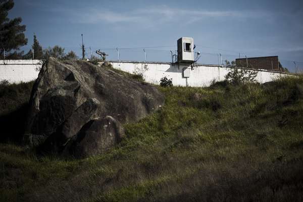 A security tower stands guard