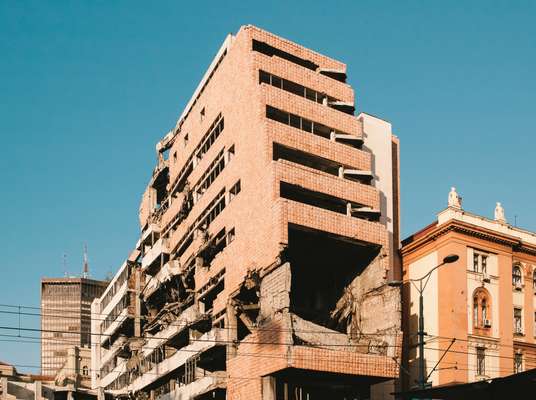 Government building still showing damage from the 1999 Nato air strikes