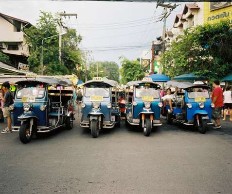 Tuk-tuk’s line the road near Wat Phra Singh