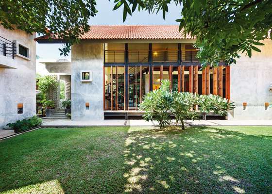 02. Harirak Residence in Bangkok. Its folding doors are made from salvaged teak