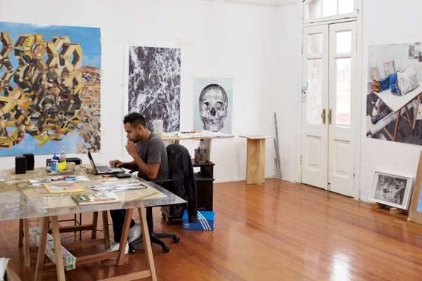 Artist Hemilio Vargas Vera at work in his Callao studio