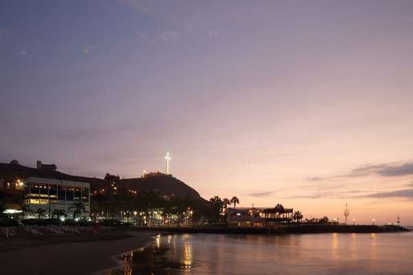 Illuminated cross in Chorrillos that guides fishermen battling Lima’s notorious sea mists