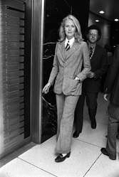 The Equal Pay Act of 1970 (UK) saw women making strides in the workplace; clothes are more masculine.
