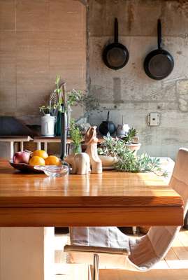 Kitchen: Sunlight floods into the kitchen-dining room from the south-facing terrace