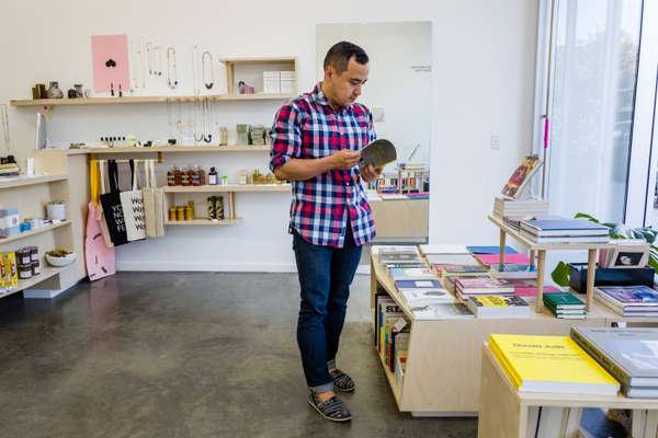 Customer shopping at Nationale, Portland