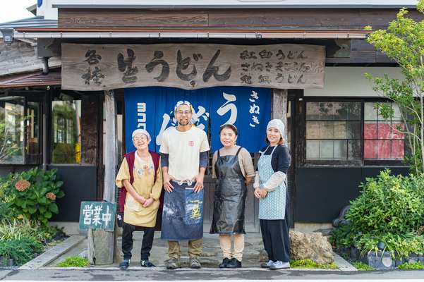Mother and son co-owners Masayo Yokokura (third left) and Hideki Yokokura (second left) with staff