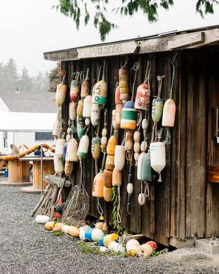 Fishing floats outside Buck Bay Shellfish shopfront 