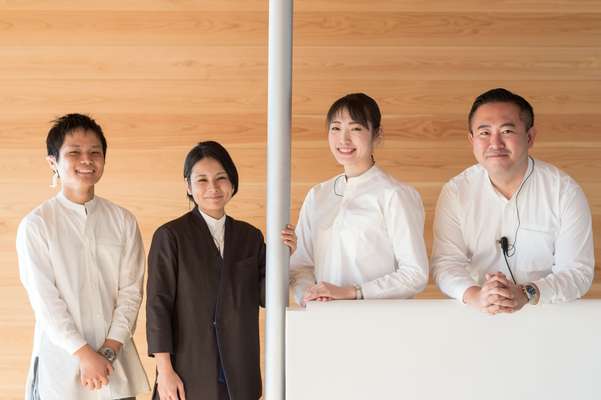 Staff in original Guntu uniforms