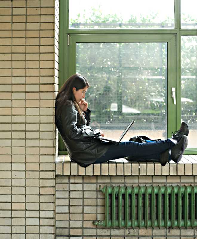 A student finds a quiet spot to do some work