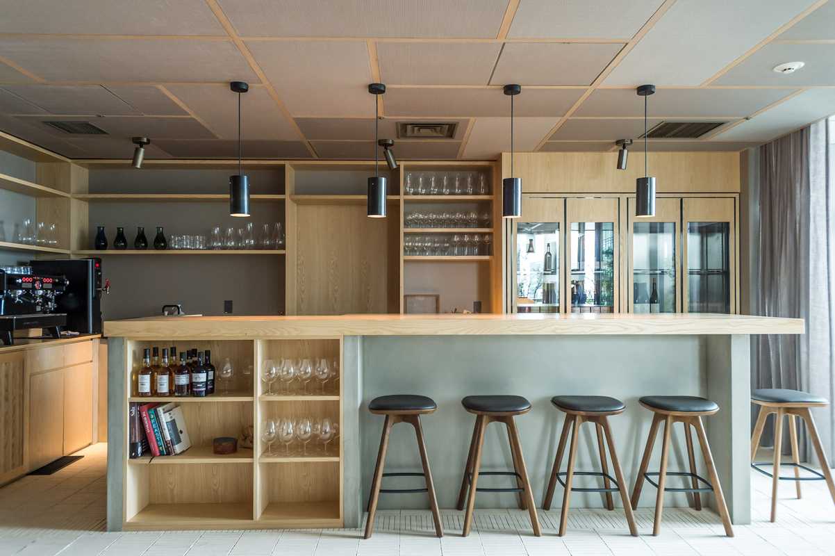Bar with bar stools by OEO for Brdr Krüger, and lights by Kaikado 