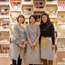 Tohoku Standard staff wearing Ishinomaki Laboratory aprons
