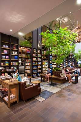 Sofas and greenery in the book section