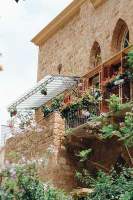 French-style shutters open  onto small balconies