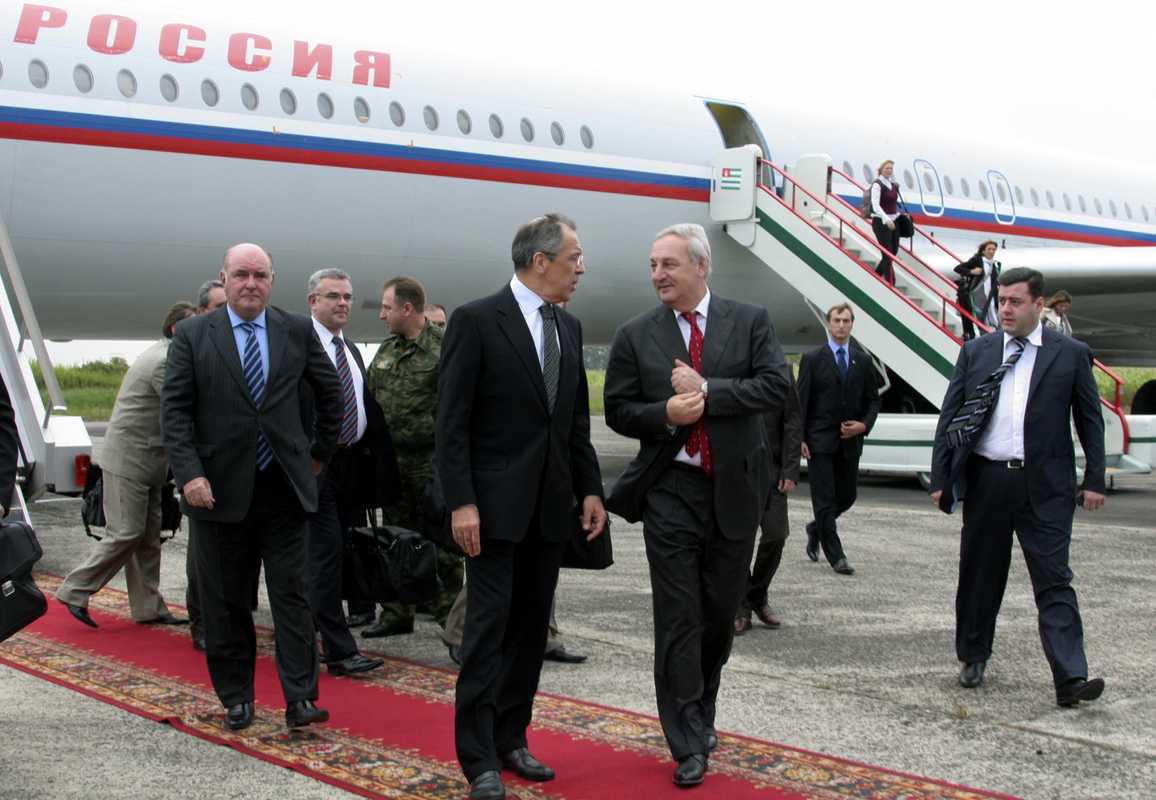 Abkhazia’s leader Sergei Bagapsh (centre right) speaks to Russian foreign minister Sergei Lavrov on his arrival in the Abkhazian capital Sukhumi