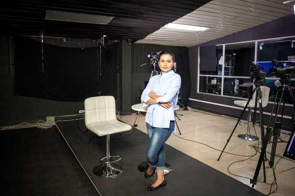 Yadira Suárez, a former Farc militant and a presenter at NC Noticias, poses for a photo after a pilot rehearsal at the main studio 